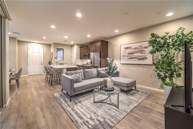 living room with light wood-type flooring