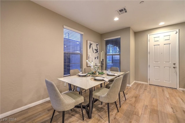 dining space featuring light hardwood / wood-style floors