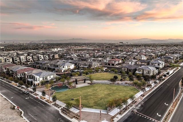 aerial view at dusk with a mountain view