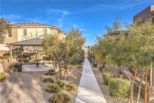 view of property's community featuring a patio area