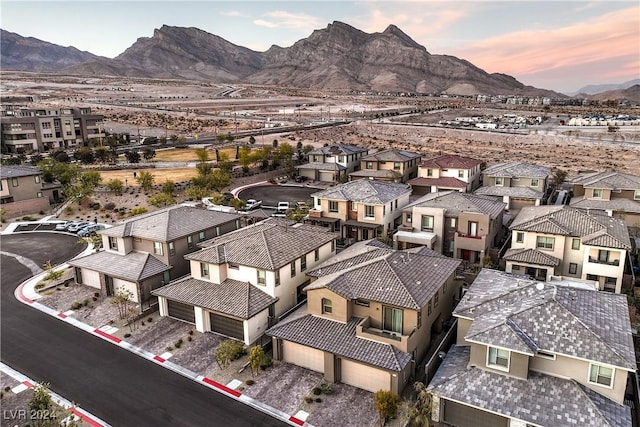 aerial view at dusk with a mountain view