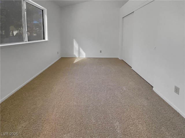 unfurnished room with carpet