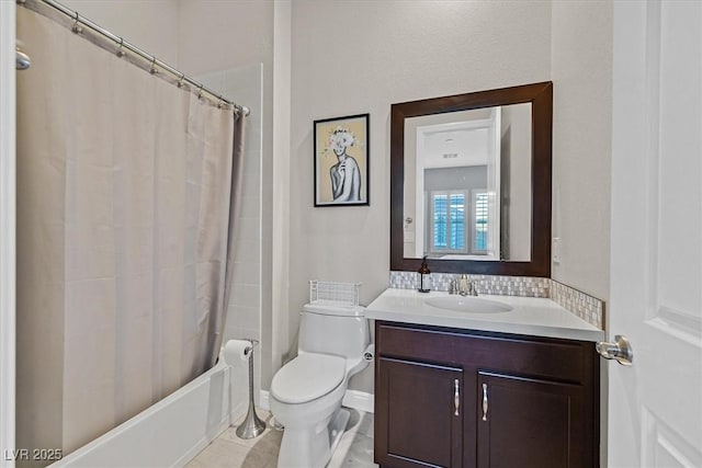 full bathroom with shower / bathtub combination with curtain, tile patterned flooring, vanity, and toilet