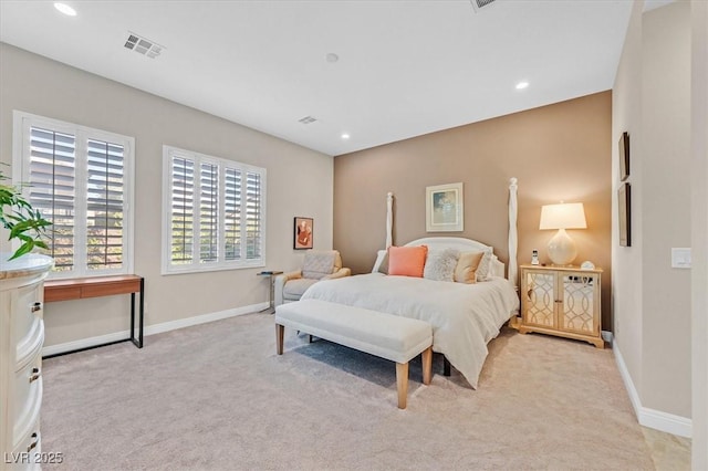 bedroom with light carpet