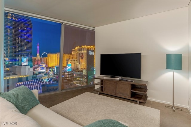 tiled living room with floor to ceiling windows