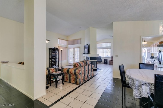 tiled living room with vaulted ceiling