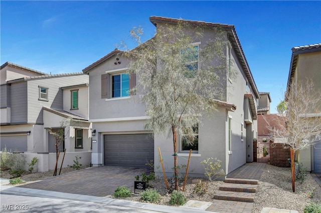 view of front of property with a garage