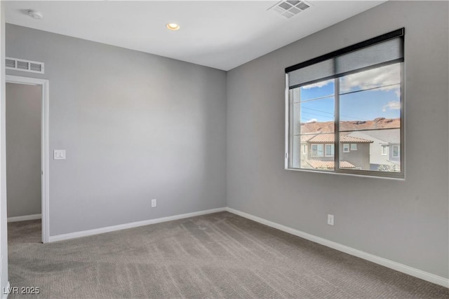 view of carpeted spare room