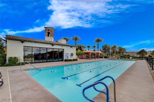 view of swimming pool with a gazebo