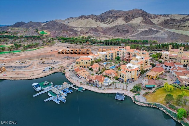 aerial view with a water and mountain view