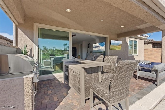 view of patio with an outdoor kitchen