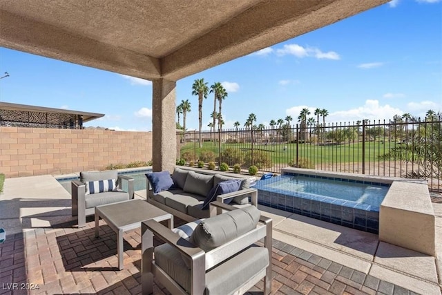 view of patio featuring an outdoor living space and a swimming pool with hot tub