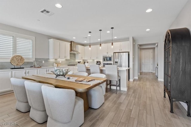 dining area featuring light hardwood / wood-style floors