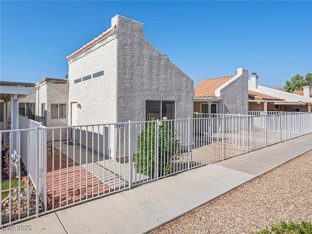 view of property exterior featuring a patio