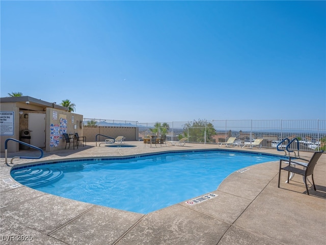 view of swimming pool featuring a patio