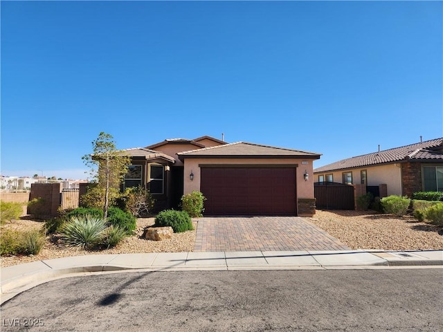 view of front of property with a garage