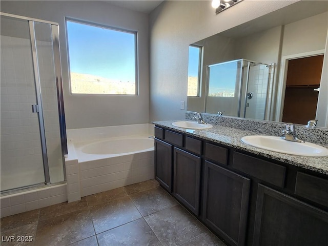 bathroom with plus walk in shower and vanity