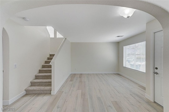 interior space with light hardwood / wood-style flooring and a healthy amount of sunlight