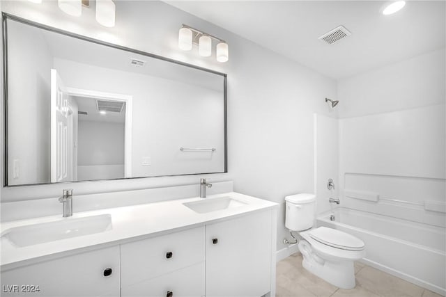 full bathroom with tile patterned floors, shower / bathing tub combination, vanity, and toilet