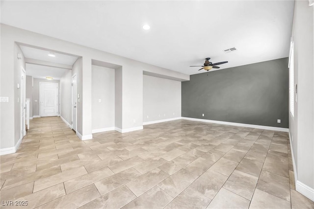 empty room featuring ceiling fan