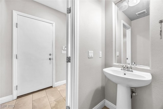 bathroom featuring tile patterned flooring