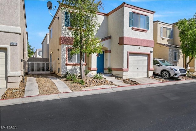 multi unit property featuring a garage