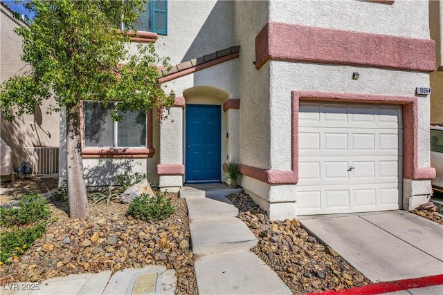 property entrance featuring a garage