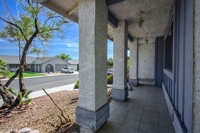 3609 Woodglen Ct, Las Vegas, NV 89108 - covered porch featuring a residential view
