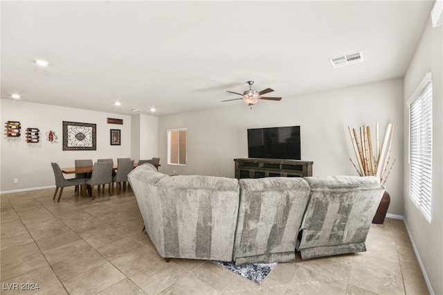 living room featuring ceiling fan