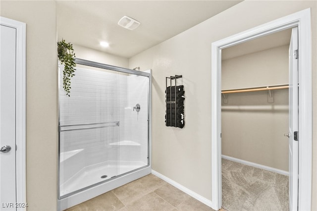 bathroom with an enclosed shower