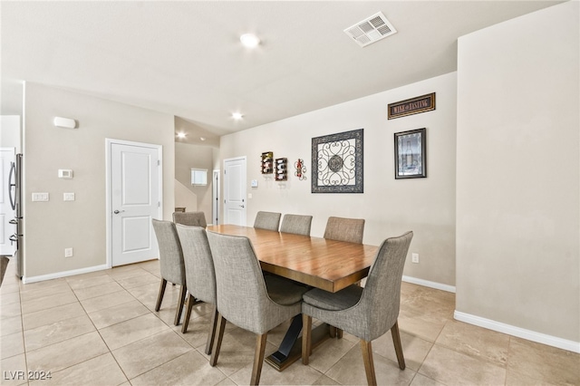 dining room with light tile patterned floors