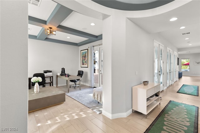 corridor featuring beam ceiling and coffered ceiling