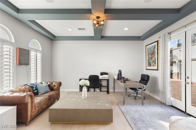 home office featuring beam ceiling, french doors, light hardwood / wood-style flooring, and coffered ceiling