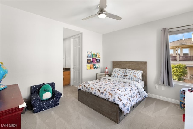 carpeted bedroom featuring ceiling fan