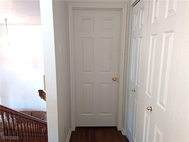 corridor featuring dark hardwood / wood-style floors