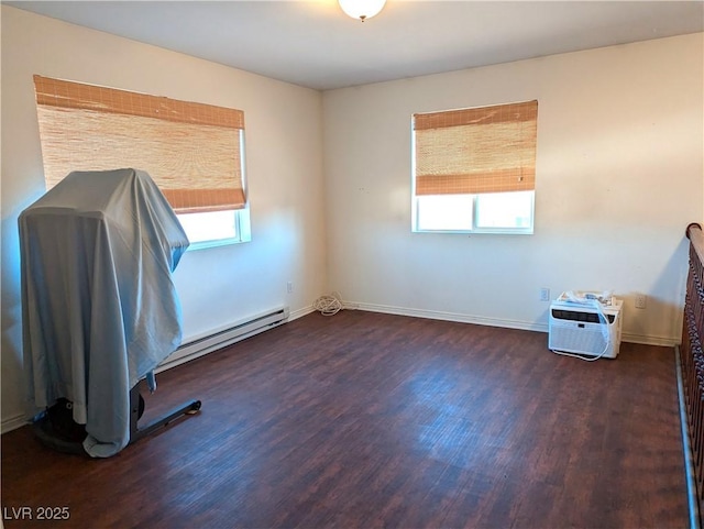 interior space with dark wood-type flooring and plenty of natural light