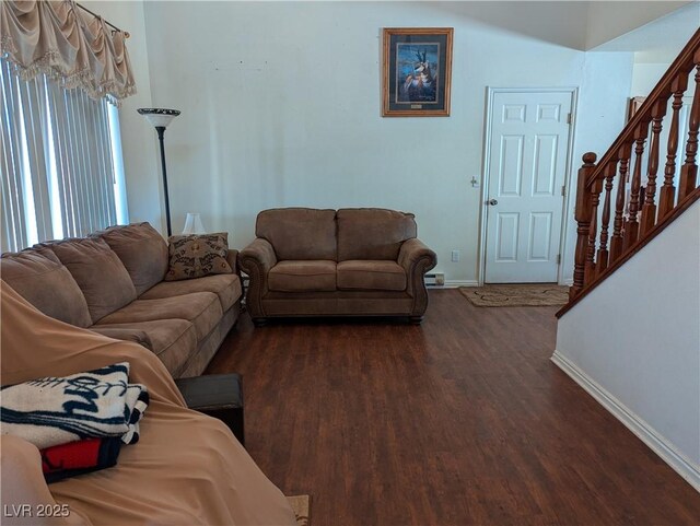 living room with dark hardwood / wood-style floors