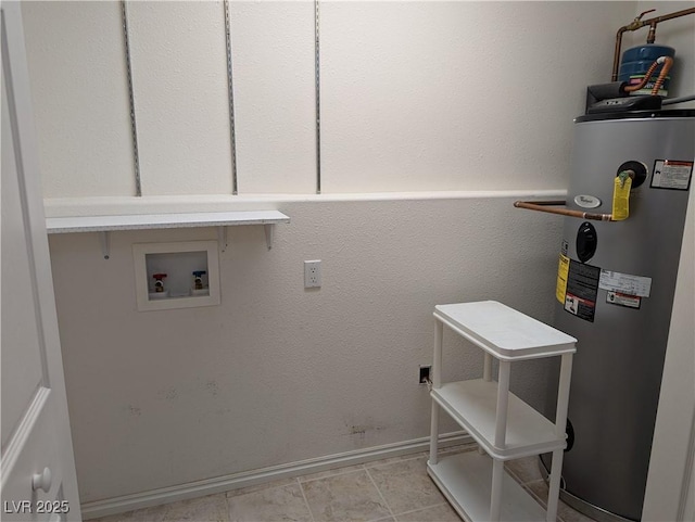 laundry room featuring hookup for a washing machine and water heater