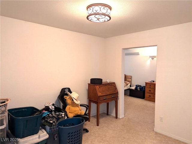 misc room with light colored carpet