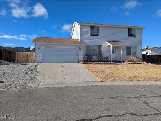 front of property with a garage