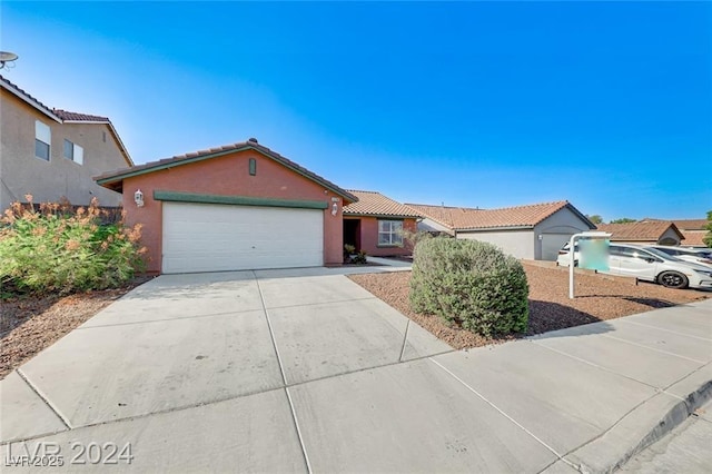 single story home with a garage