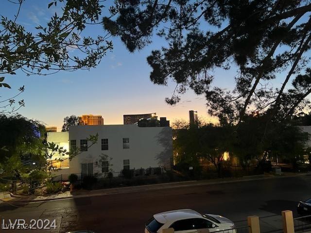 view of outdoor building at dusk