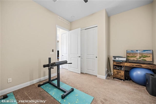 workout room with carpet floors