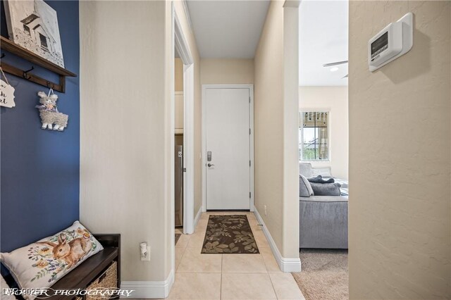 interior space featuring light tile patterned floors