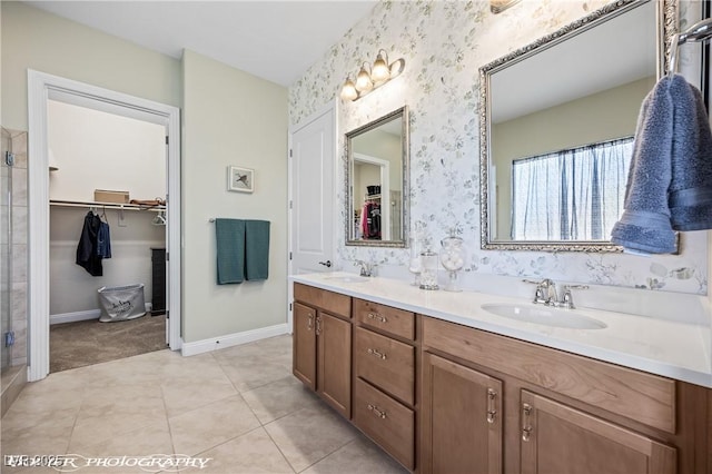 bathroom with tile patterned flooring and vanity