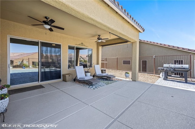 view of patio with ceiling fan