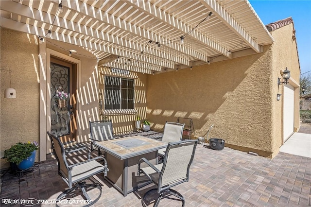 view of patio featuring a pergola