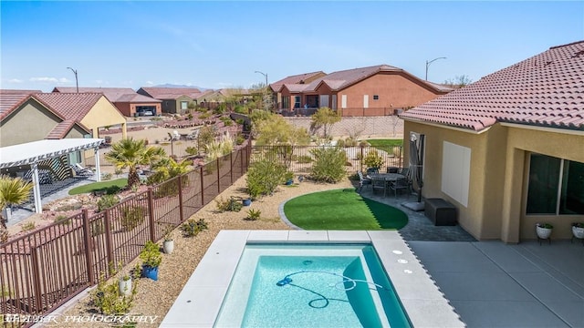 view of swimming pool with a pergola, a yard, and a patio