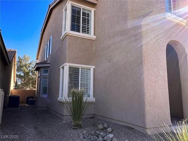 view of home's exterior featuring central air condition unit