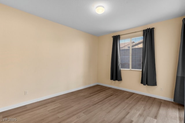 empty room with light wood-type flooring